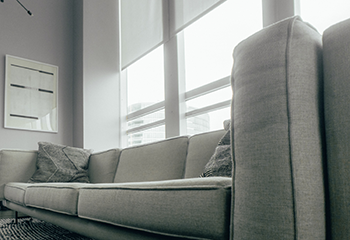 Modern home interior featuring sleek automated roller shades